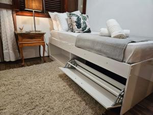 Aconchegante suite privativa com garagem, piscina e sauna