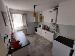 Appartements le Fossie - grand T2 - basique propre et fonctionnel avec parking : photos des chambres