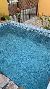 Casa ampla com piscina 4 quadras da praia , Espaço gourmet churrasqueira - 伊塔尼亚恩