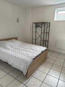 Maisons de vacances Spacieuse maison avec garage 5 mins valenciennes : photos des chambres