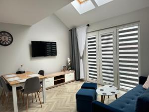 APARTAMENTY TYSIĄCLECIA