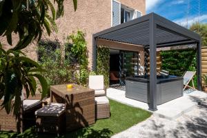 Appartements Honey Moon - studio romantique Jacuzzi et ecran cinema : photos des chambres