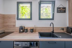 Appartements Honey Moon - studio romantique Jacuzzi et ecran cinema : photos des chambres