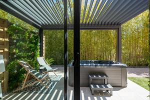 Appartements Honey Moon - studio romantique Jacuzzi et ecran cinema : photos des chambres