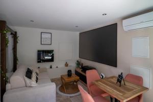 Appartements Honey Moon - studio romantique Jacuzzi et ecran cinema : photos des chambres