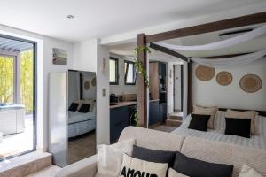 Appartements Honey Moon - studio romantique Jacuzzi et ecran cinema : photos des chambres