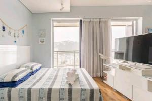 Unlimited Ocean Front - Frente à Praia Vista Mar Hidromassagem 2 Piscinas Climatizadas 2 Saunas Seca e Úmida Wi-Fi 350MB