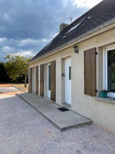 Maisons de vacances Maison - Reville avec son boulodrome ! : photos des chambres