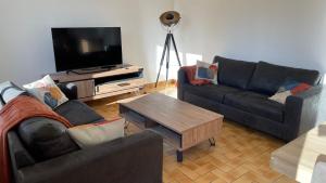 Maisons de vacances Maison - Reville avec son boulodrome ! : photos des chambres