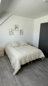 Maisons de vacances Maison - Reville avec son boulodrome ! : photos des chambres