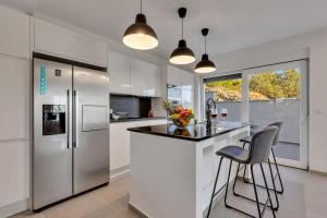 Family friendly apartments with a swimming pool Podgora, Makarska - 11937