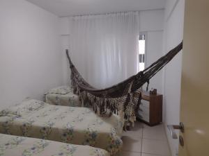 ACONCHEGANTE APARTAMENTO BEIRA MAR