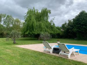 Appartements Appartement familial au bord de la Marne, jardin tropical , piscine, tennis, terrasse, parking gratuit proche Disneyland : photos des chambres