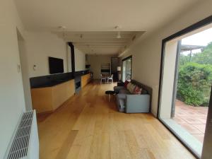 Designer home with pool near beach and village