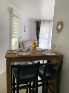 Appartements La colline aux oiseaux : photos des chambres