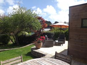 Maisons de vacances Charmante maison avec jardin a Guidel, proche nature : photos des chambres