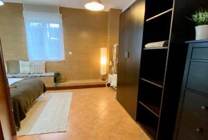 La Casuca del Postillo (Bajo con jardín y piscina)