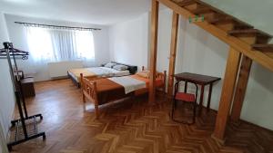 Three-Bedroom Apartment room in Guesthouse Trikic