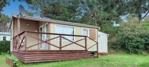 Chalets Au Soleil Couchant - Camping Bel Sito Natura 2 000 : photos des chambres