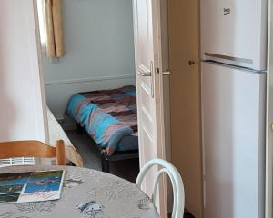 Chalets Au Soleil Couchant - Camping Bel Sito Natura 2 000 : photos des chambres