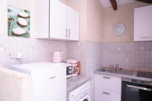 Appartements Aria : photos des chambres