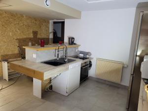 Appartements appartement lowcoast : photos des chambres