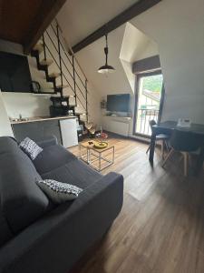 Appartements Reve Divin T4 avec parking-barbecue-laverie-bagagerie-salle de sport-aire de jeux-climatise : photos des chambres