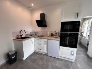 Appartements La petite maison : photos des chambres