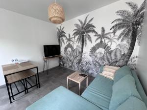 Appartements La petite maison : photos des chambres