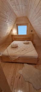 Imantas guļbaļķu namiņš ar pirti