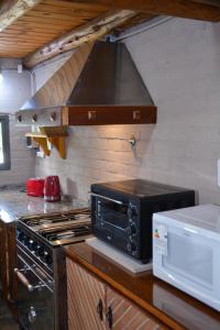 POSADA ROSSINA Habitaciones con baño privado y ambientes compartidos