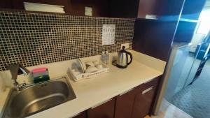 SUN GARDEN Studio and Residences at South China Sea Place Suites