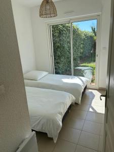 Rez de Jardin Piscine et Plage
