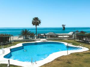 Marbella Beachfront - Exclusivo apartamento en primera linea de playa