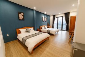 Phòng 4 Người Có Ban Công (Quadruple Room with Balcony)