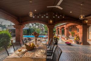 SaffronStays Chira-5BR heritage villa with laterite stone walls, verandah sit-outs & private pool