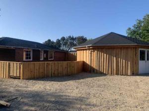 Summer House With Shelter And Water View