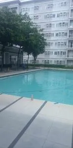 Comfy 1 Bedroom with Netflix & Free Wifi - Trees Residences Condominium - Tubigan