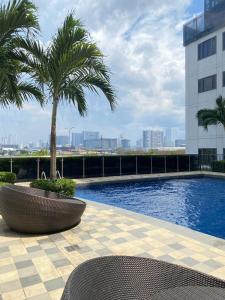 Aesthetic walking distance to MOA,near NAIA AIRPORT with NETFLIX,MINIVIDEOKE,BOARDGAMES-DUXE3