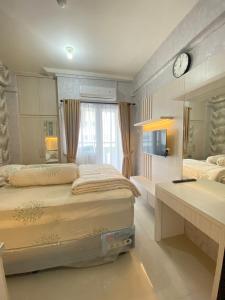 Apartemen Green Pramuka City Type Studio Full Furnish