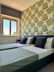 Appartamenti In Villa Polluce a 2 min dal mare WiFi e parcheggio