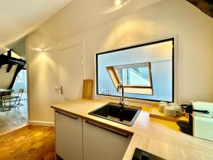 Appartements Loft BEST KEYS - Centre Ville - Place Cathedrale : photos des chambres