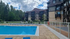 Appartements 2 pieces avec piscine chauffee : photos des chambres