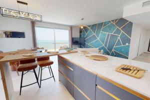 Spendide appartement tout confort, Résidence Archipel T4 en bord de plage, avec grande terrasse aménagée,spa et parking privé