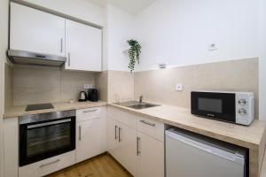 NEW home with PARKING by the City Park