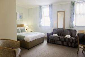 Family Room with Sea View (2 Adults + 2 Children) room in Carousel Hotel