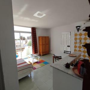 Appartement Les Oliviers avec piscine proche du lagon