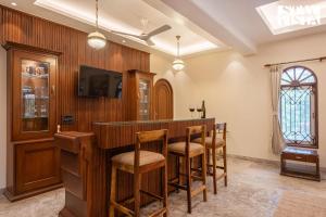 StayVistas Hillside Serenity - Hill-view villa with Outdoor pool, Bar, Spacious lawn, and Indoor & Outdoor activities