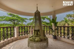 StayVistas Hillside Serenity - Hill-view villa with Outdoor pool, Bar, Spacious lawn, and Indoor & Outdoor activities