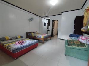 Riverside at Aninuan Accommodation and Food